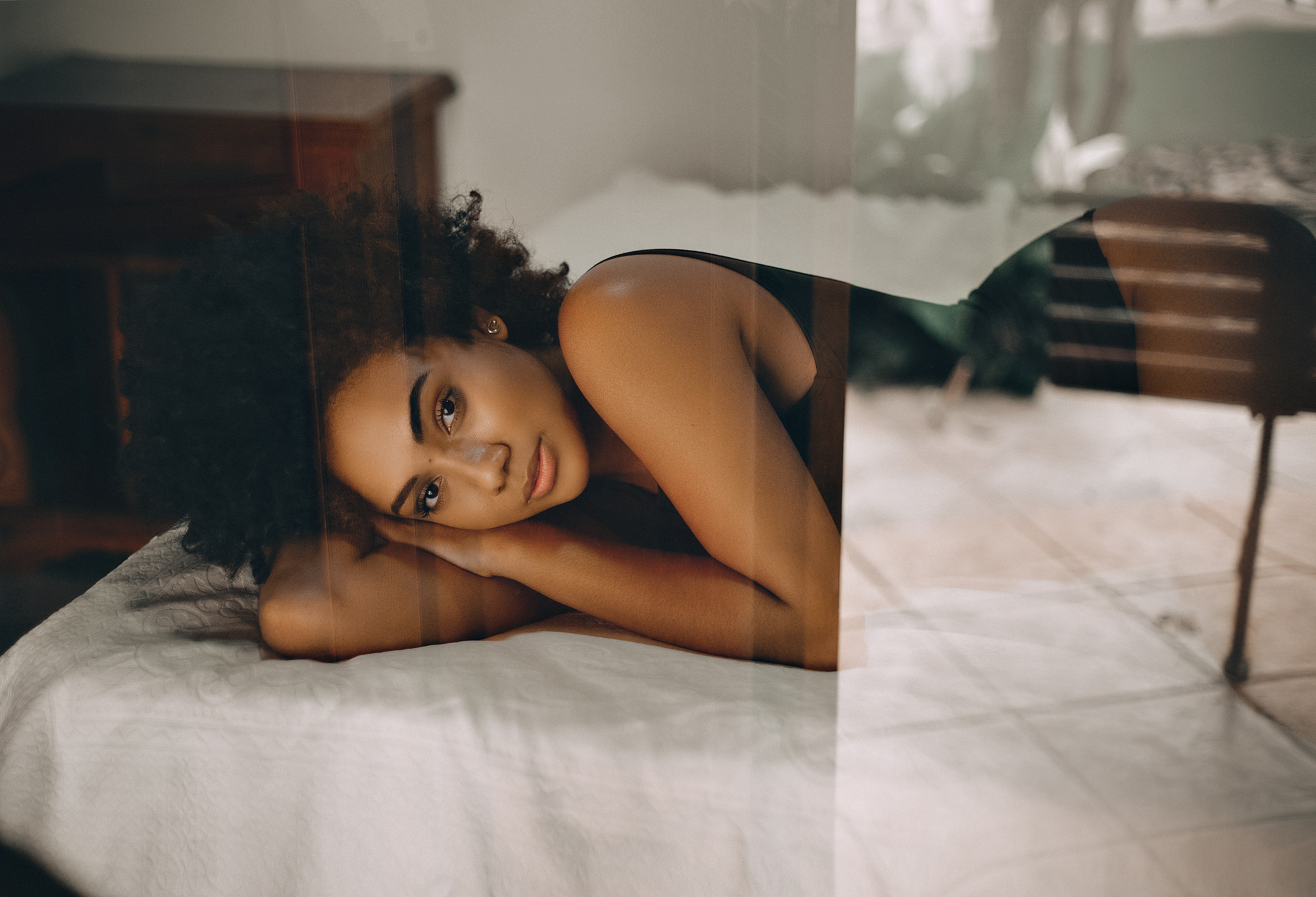 afro-hair-beautiful-woman-bed-1982966